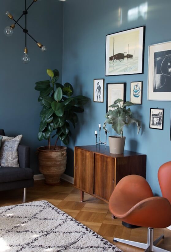 mid century living room with blue walls