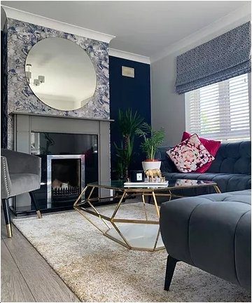 Modern glam living room design with gold and bright pink