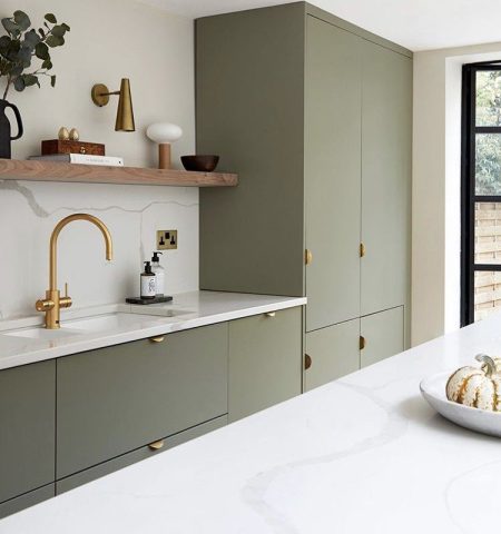 moss green kitchen with brass and marble
