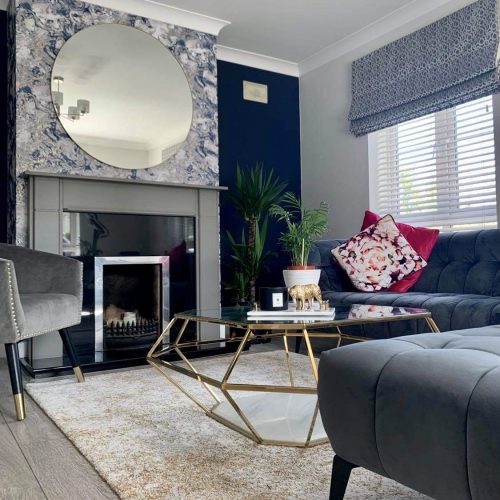 transformation grey fireplace with round mirror above